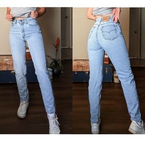 Vintage Levi’s 512 light wash distressed slim fit jeans